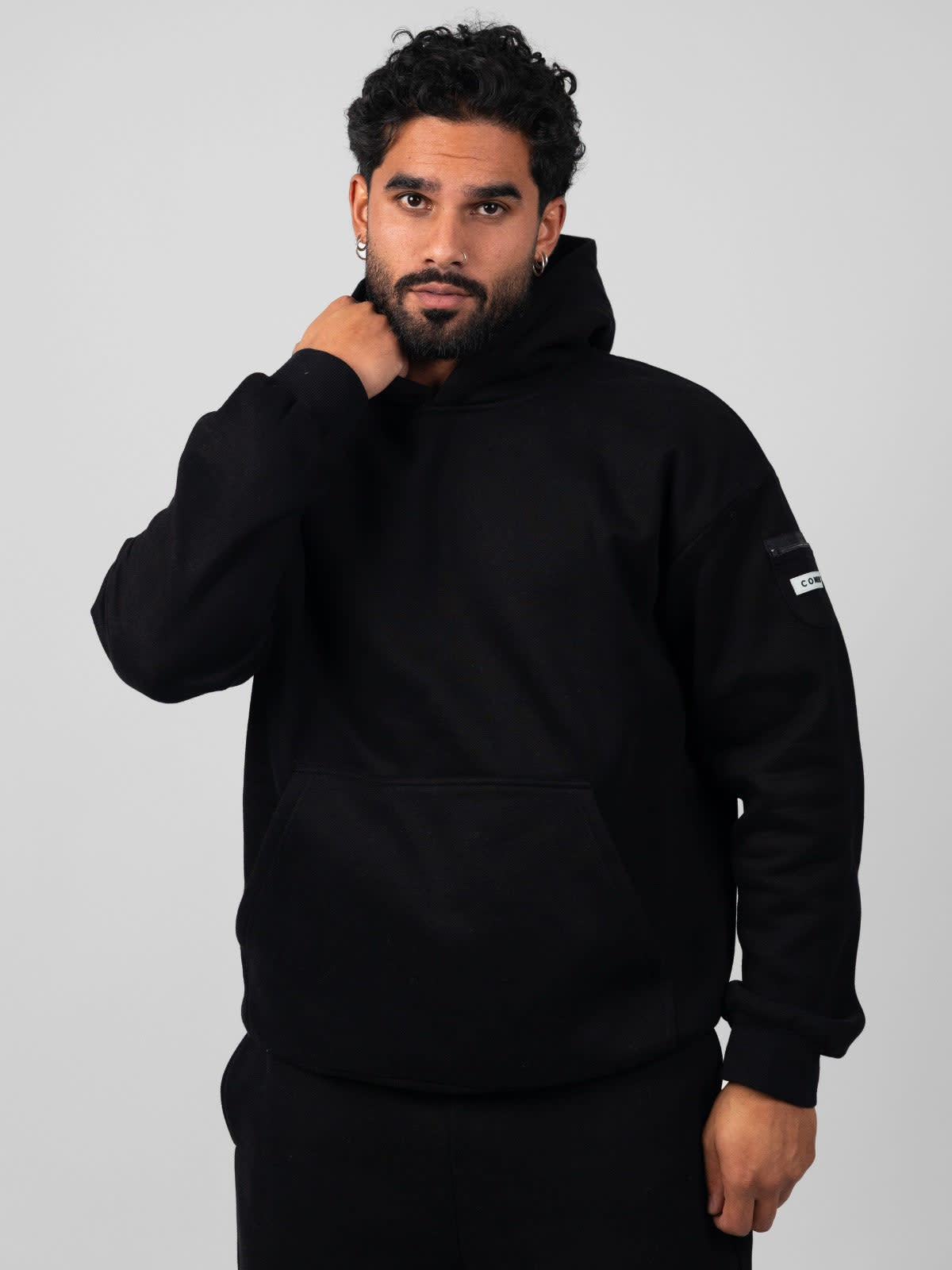 Qamis™ x Comfrt Travel Essentials Hoodie