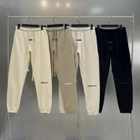 Qamis™ x Essentials Sweatpants – 100% Cotton, Reflective Print, High Street Fit